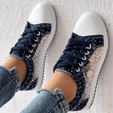 Caro – Elegantne naiste sneaker lilledega detailidega