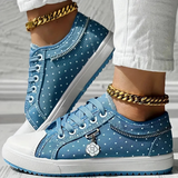Caro – Elegantne naiste sneaker lilledega detailidega