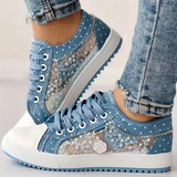 Caro – Elegantne naiste sneaker lilledega detailidega