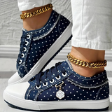 Caro – Elegantne naiste sneaker lilledega detailidega