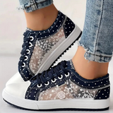 Caro – Elegantne naiste sneaker lilledega detailidega
