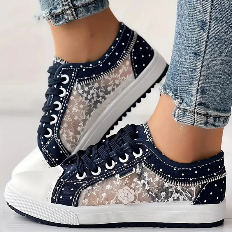 Caro – Elegantne naiste sneaker lilledega detailidega