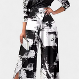 Brina – Elegantne avatud õlgadega jumpsuit